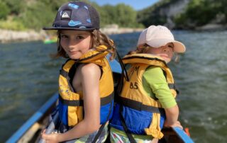 Family canoeing in the morning under the Pont d’Arc – from 3 years old