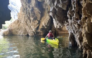 Family canoeing in the morning under the Pont d'Arc - from 3 years old