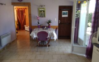 perspective grande cuisine et ouverture salon porte cellier-buanderie